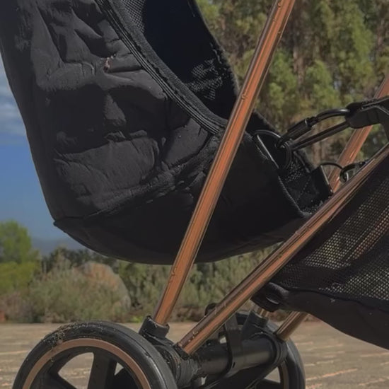 The Stroller Sling All-Weather demo video showing the hammock stroller seat attachment in use