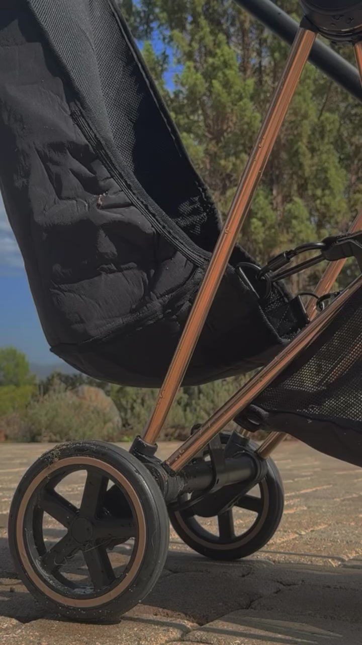 The Stroller Sling All-Weather demo video showing the hammock stroller seat attachment in use